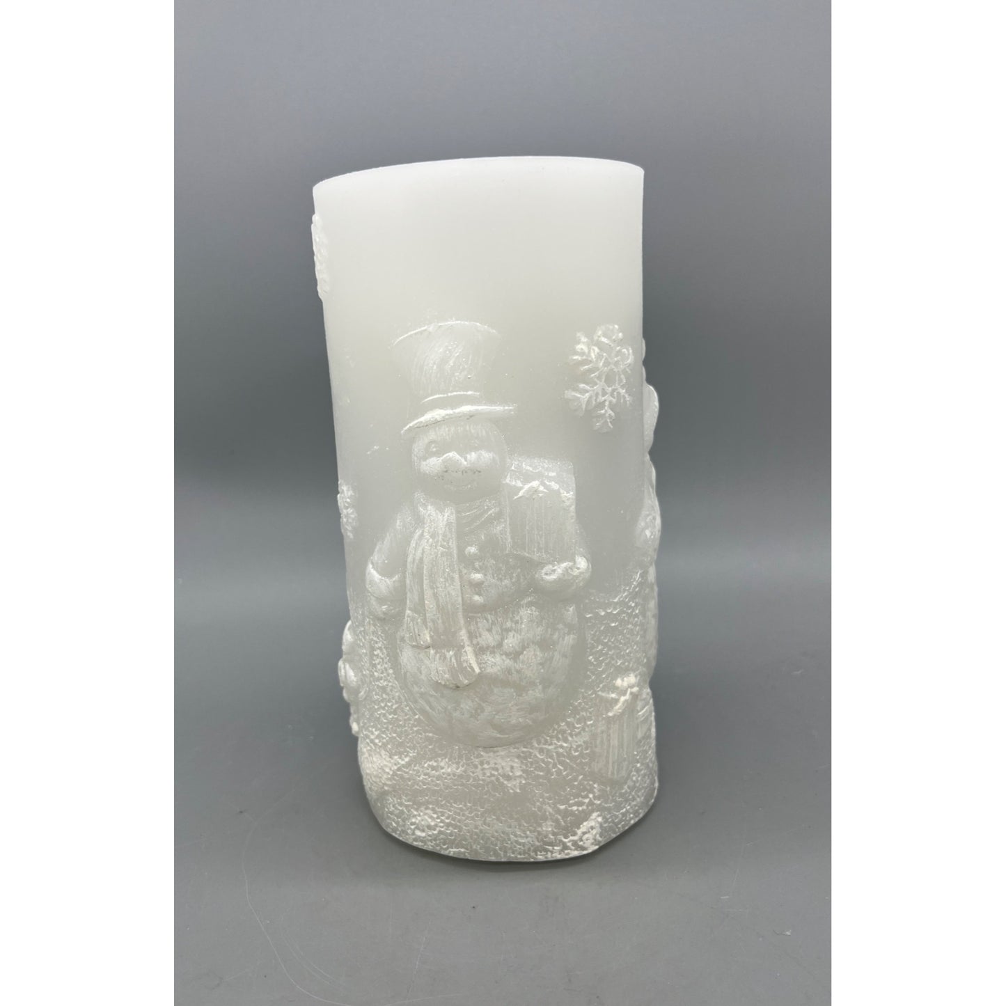 Snowman Embossed LED Flameless Fountain Candle 8" Tall White Frosted Glow Winter Décor Battery Operated