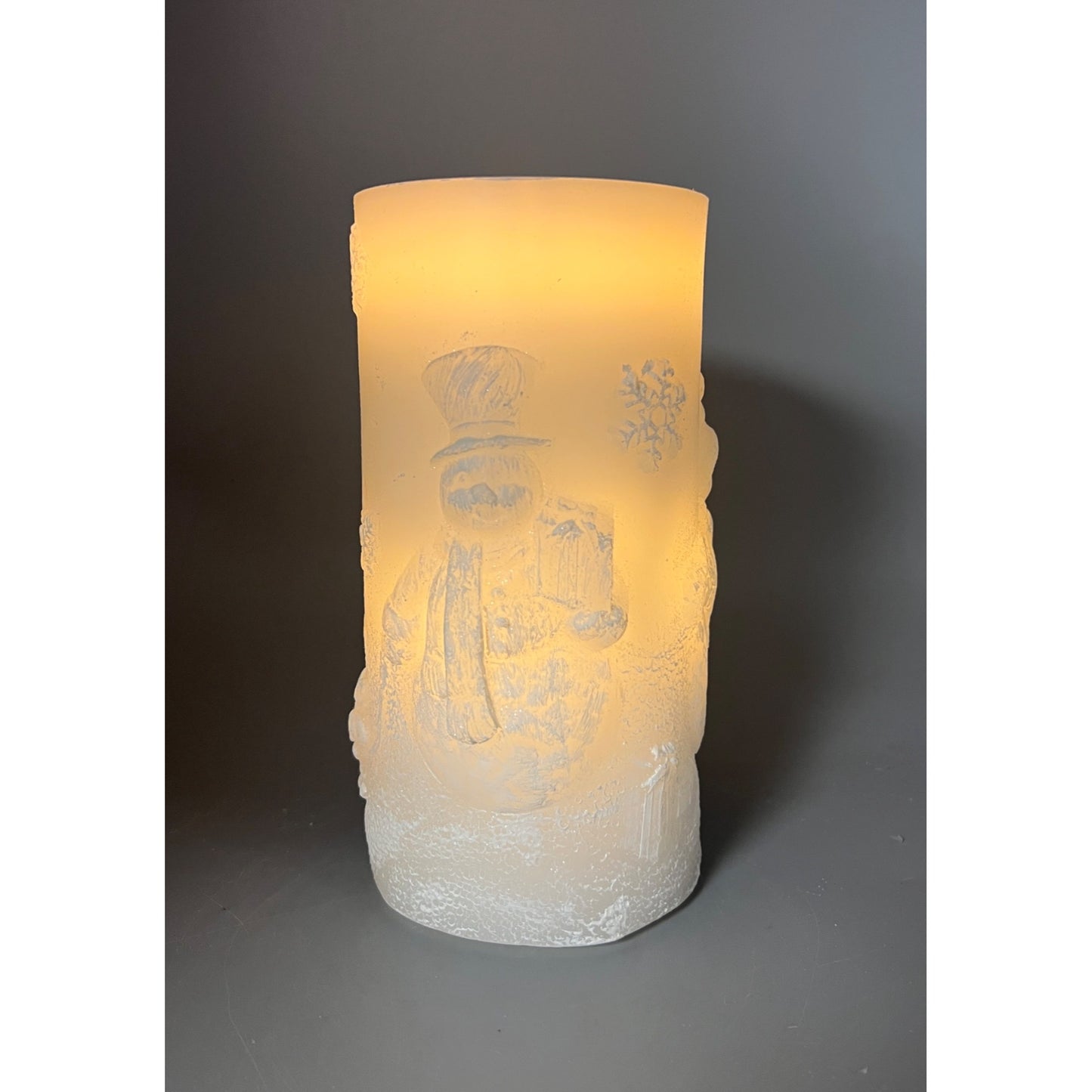Snowman Embossed LED Flameless Fountain Candle 8" Tall White Frosted Glow Winter Décor Battery Operated