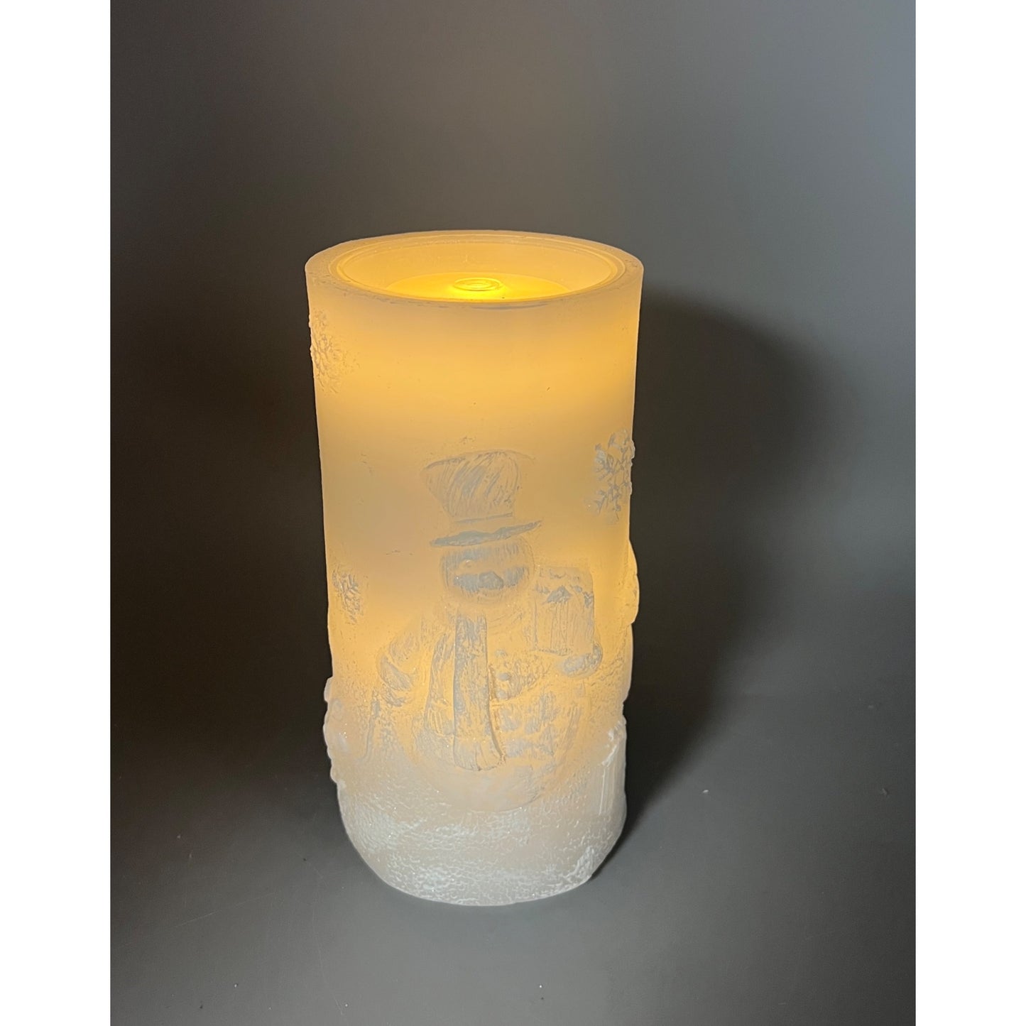 Snowman Embossed LED Flameless Fountain Candle 8" Tall White Frosted Glow Winter Décor Battery Operated